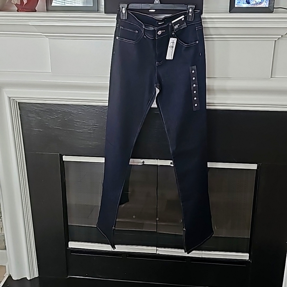 Express dark blue Skyscraper mid rise jeans. Sz 6 reg